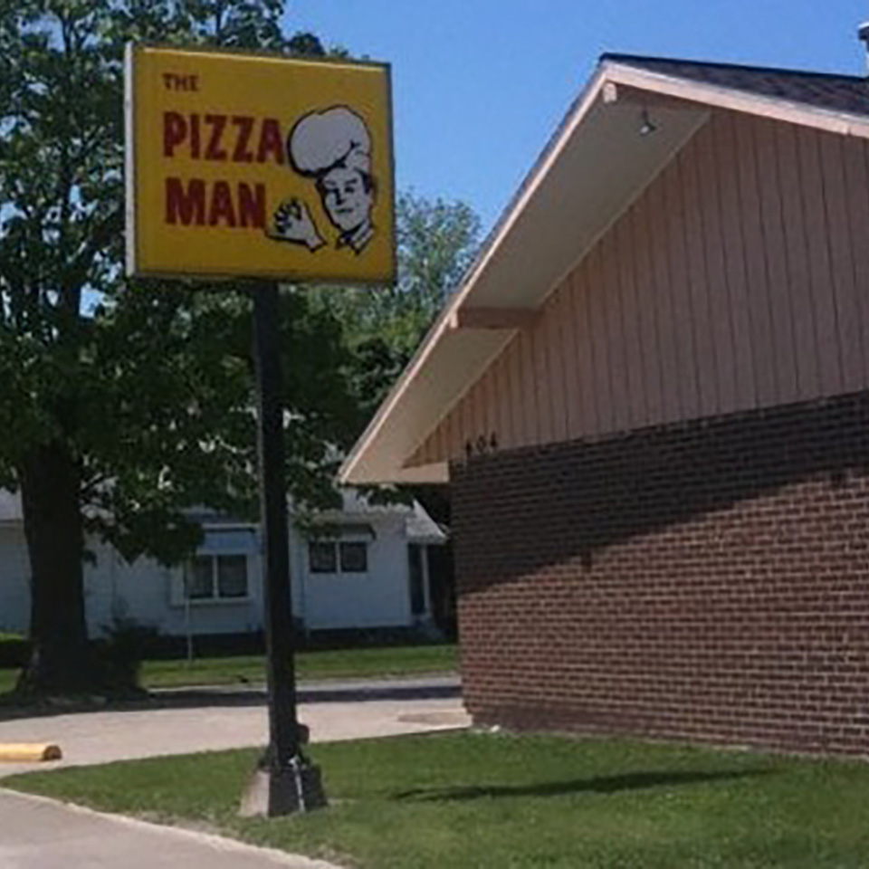 Pizza Man sign outside of the building